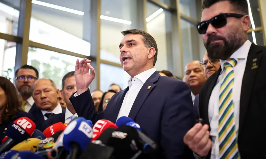 flavio confirma encontro com vorcaro apos banqueiro ter sido preso